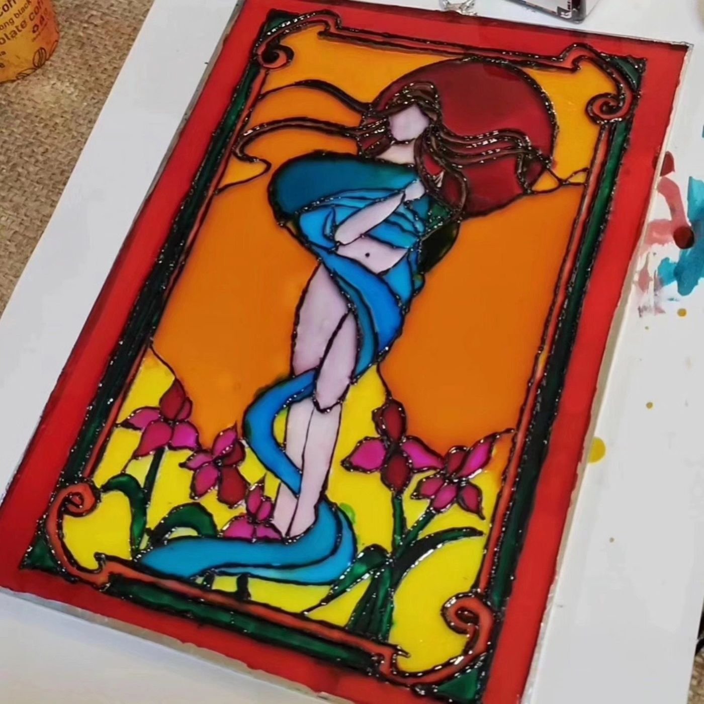 Art Nouveau figure painted on glass