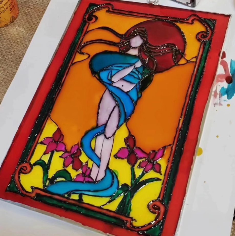 Art Nouveau female figure painted on glass at a glass painting workshop in Jabal Al-Lweibdeh