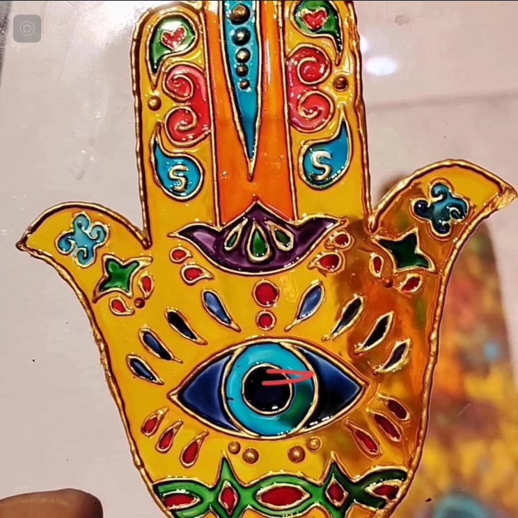 Hamsa hand glass painting with intricate colour detail made at Gilgamesh for Creative Arts, Amman